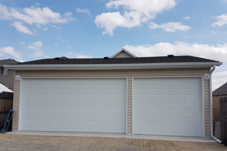 Custom detached garage built by V AAR Exteriors in Calgary with durable siding and roofing
