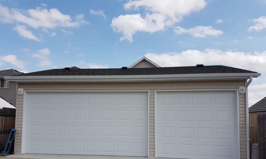 Custom detached garage built by V AAR Exteriors in Calgary with durable siding and roofing