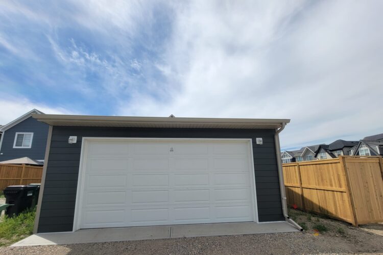 Need Garage Build with Concrete Pad by V AAR Exteriors & Home Improvements Ltd.